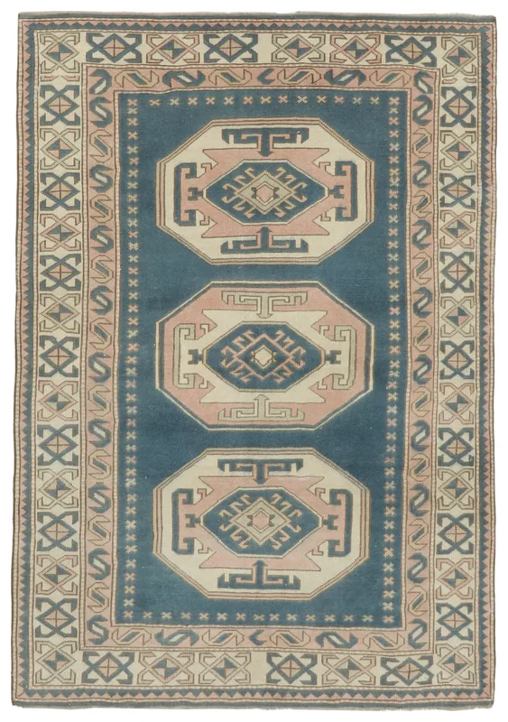 Full overhead view of the blue and rose vintage Anatolian rug