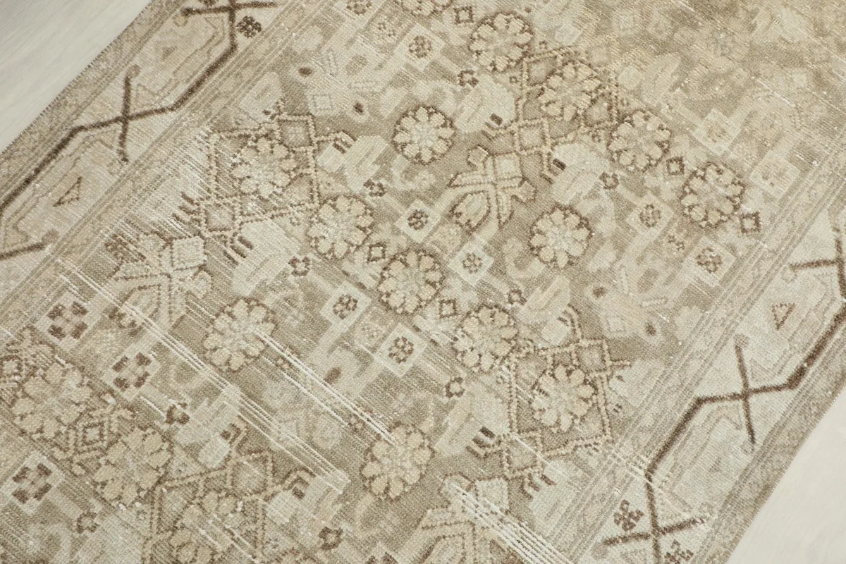 Close-up of the central patterns, showing the intricate geometric and floral designs.