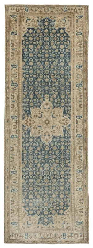 Full top view of the vintage Anatolian runner rug on a white background