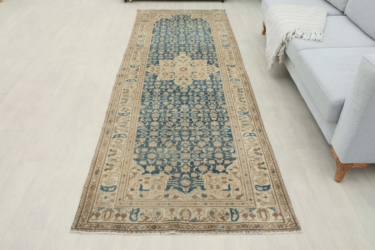 Full room view of the runner rug extending from the foreground into the background
