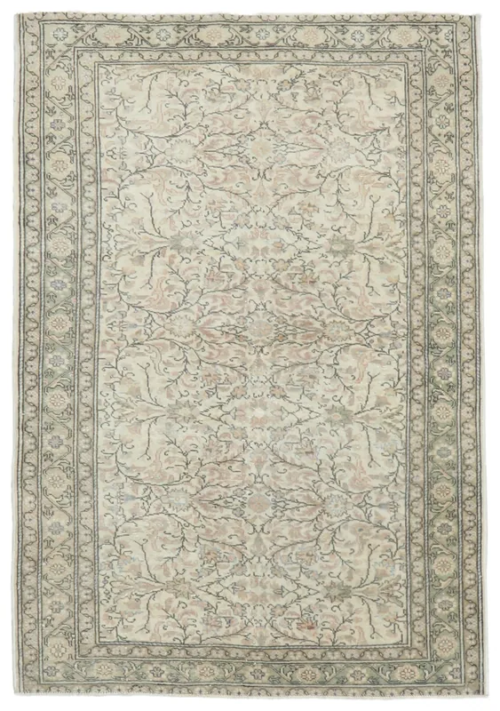 Full top view of the 4x6 ivory and rose floral vintage Anatolian rug on a white background