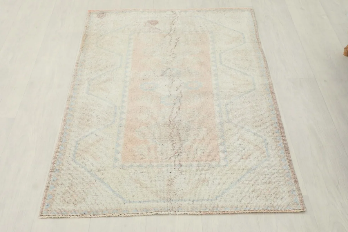 Full overhead view of the vintage Anatolian rug, showcasing its rectangular shape and overall design
