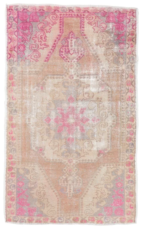 Full top view of the vintage tan and rose Anatolian area rug