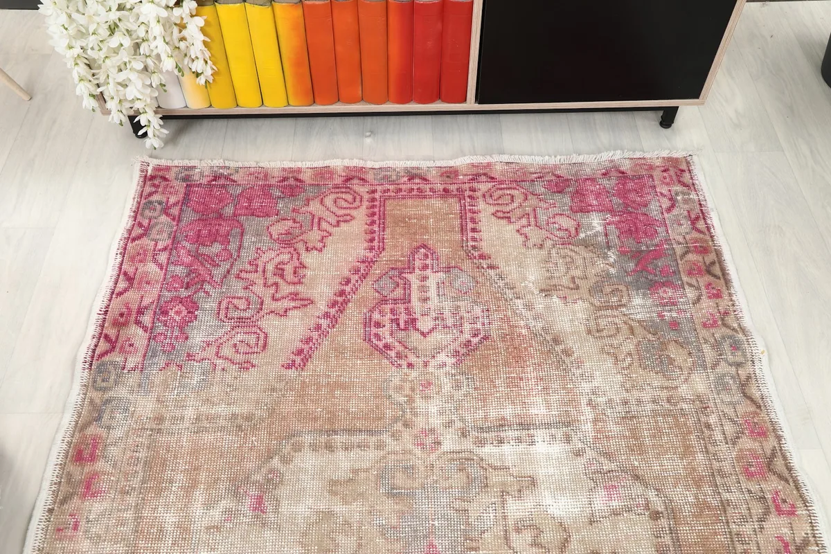 Overhead view of the top half of the rug, highlighting the field and border
