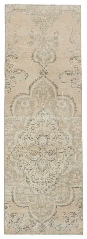 Full top view of the 2'6" x 7'3" vintage Anatolian runner rug with a medallion pattern.