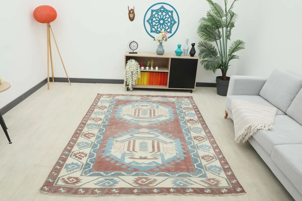 Full room view of the vintage Anatolian rug, providing context for its size and design.