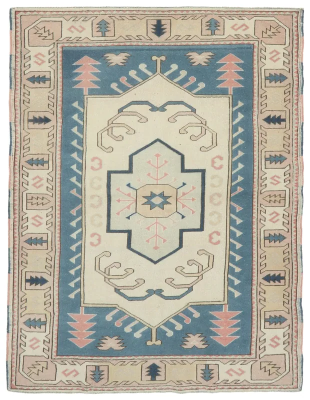 Full overhead view of the 4'7" x 6'1" vintage Anatolian rug on a white background.