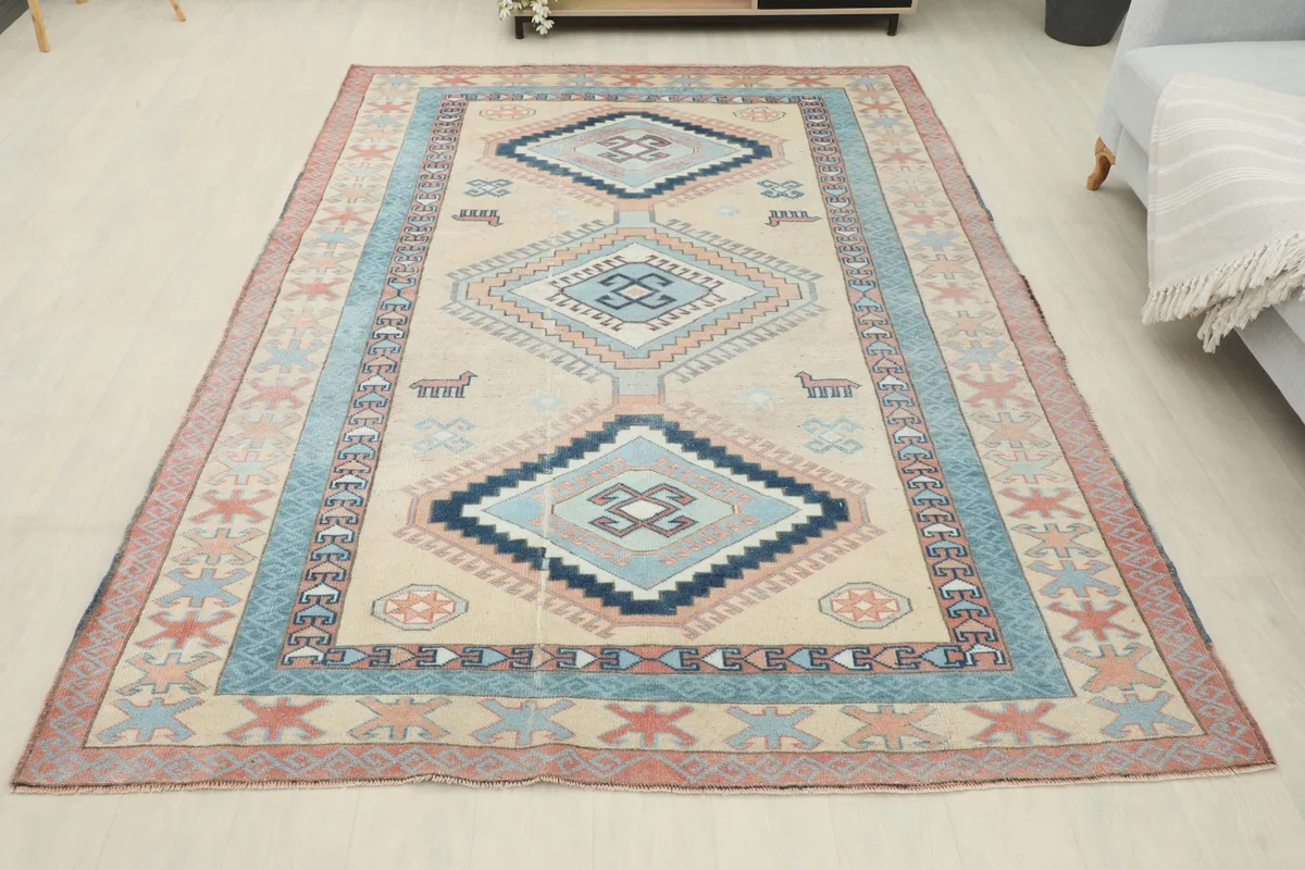 Full overhead view of the vintage Anatolian rug in a room, showcasing its complete design