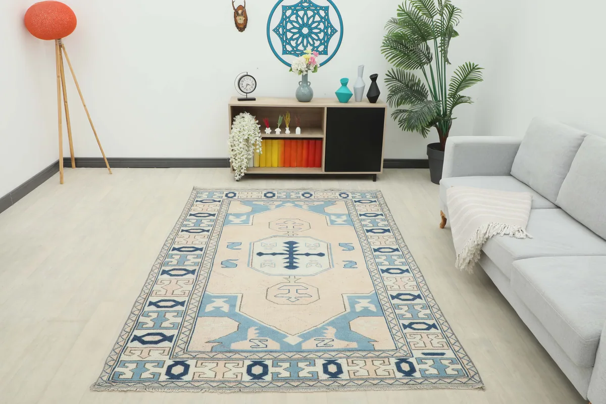 Full room view of the Cream Blue Geometric Anatolian Rug, showcasing its impact on the space