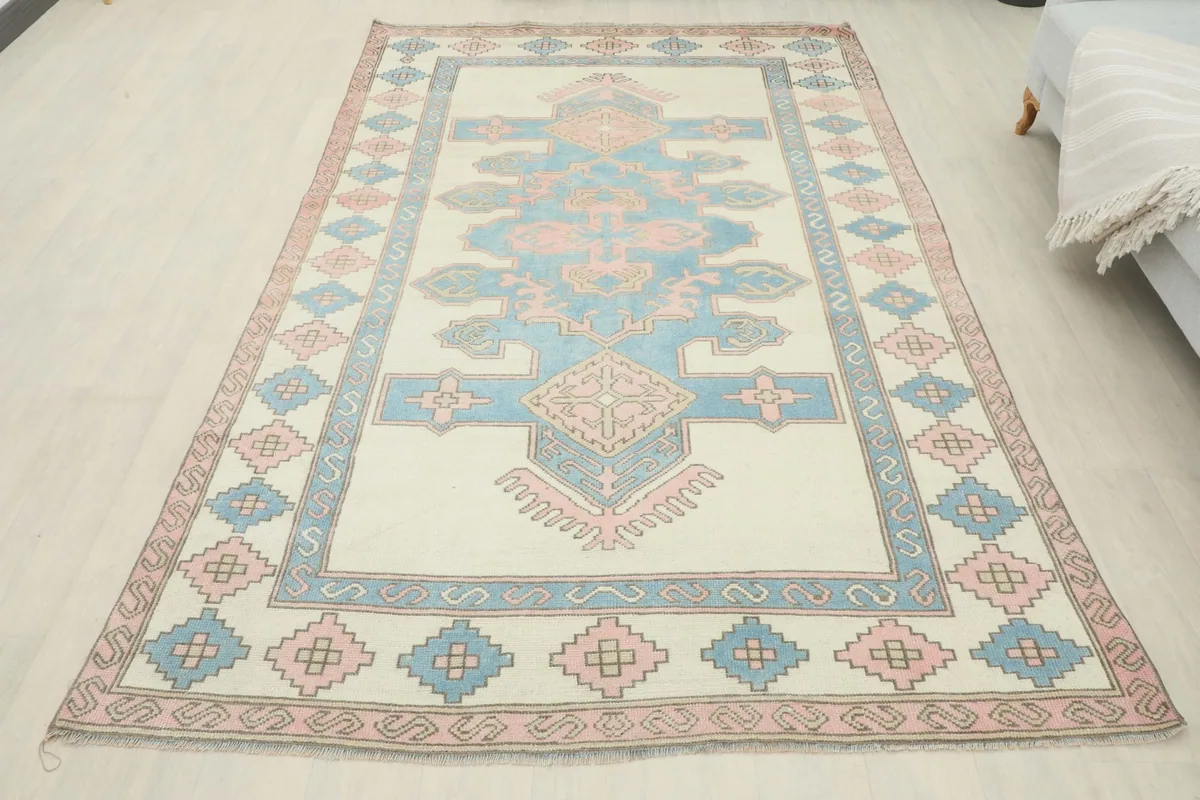 Full view of the rug laid out in a room, offering a sense of scale and presence