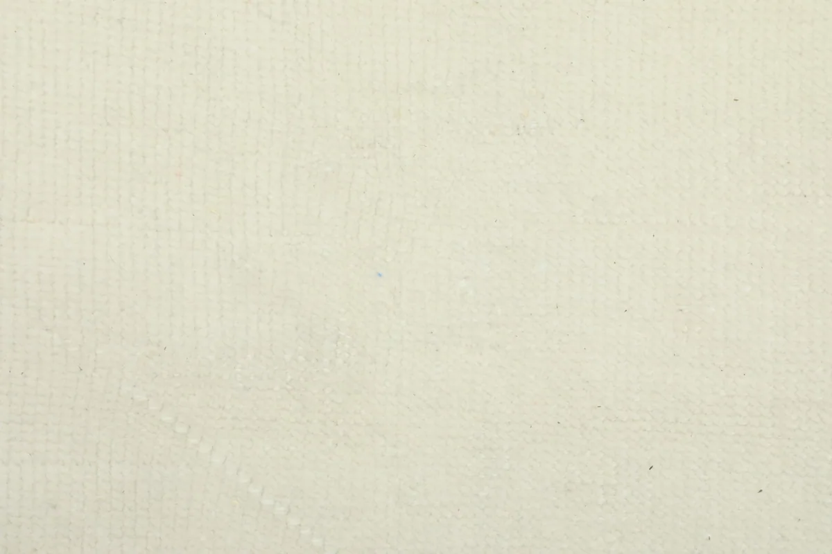 Close-up of the cotton foundation on the back of the hand-knotted rug
