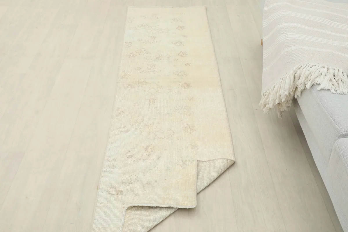 Rug folded to show its flexibility and overall appearance from an elevated angle.