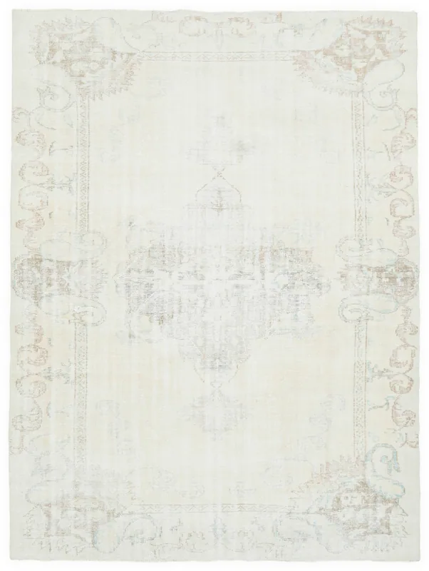 Full top view of the 6'10" x 9'3" cream vintage Anatolian rug with a faded medallion design