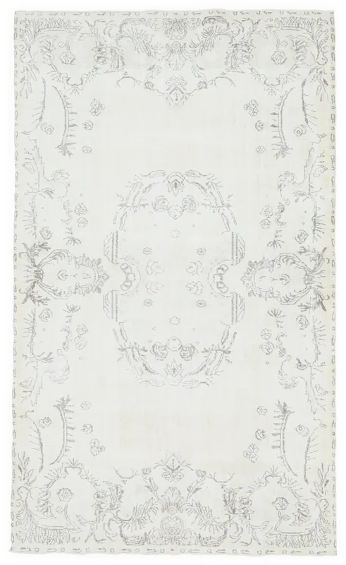 Full overhead view of the 5'11" x 9'11" vintage Anatolian rug with ivory field and gray patterns