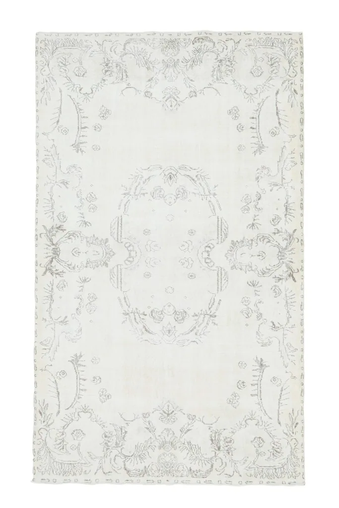 Full top view of the vintage Anatolian rug, highlighting its complete design and coloration