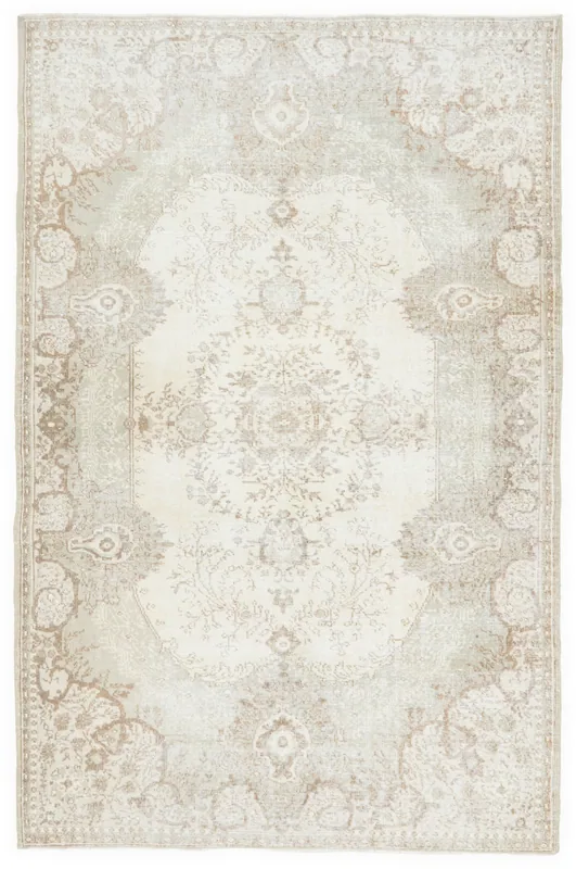 Full top view of the vintage ivory and beige medallion area rug on a white background.