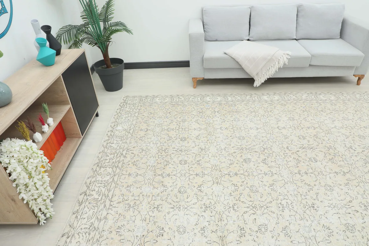 Beige Floral Anatolian Rug from an elevated angle in a room, emphasizing its generous proportions.