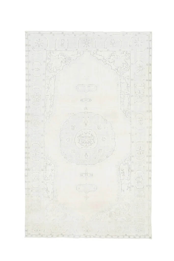 Full overhead shot of the ivory vintage Anatolian rug, showcasing its complete design and dimensions