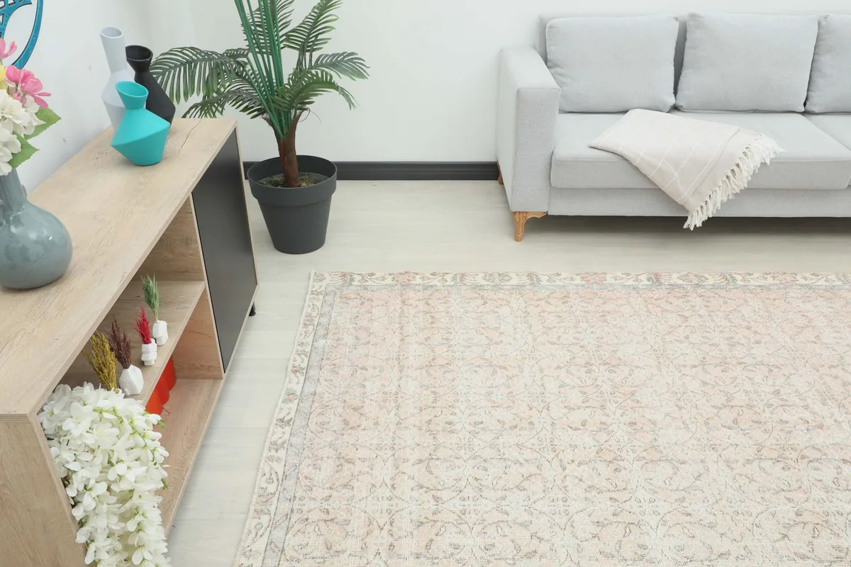 Another room view, showing the rug's placement in a modern living space with light decor