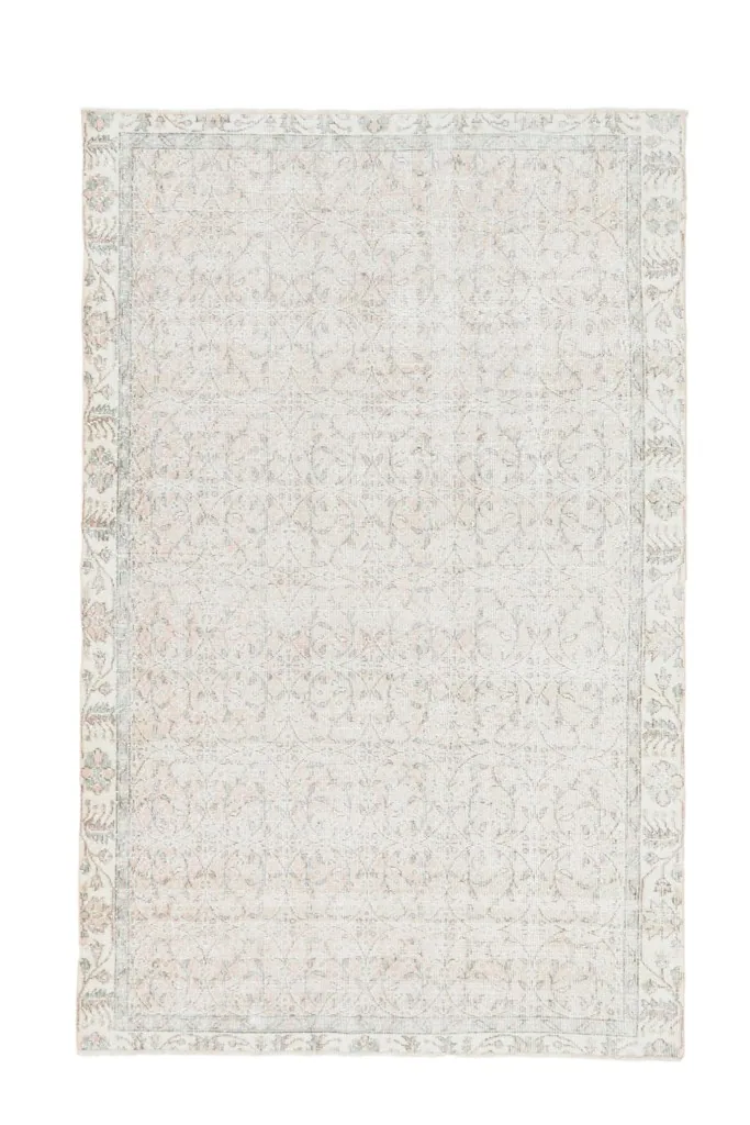 Full overhead view of the 5x8 ivory and rose vintage Anatolian rug, showcasing its complete design