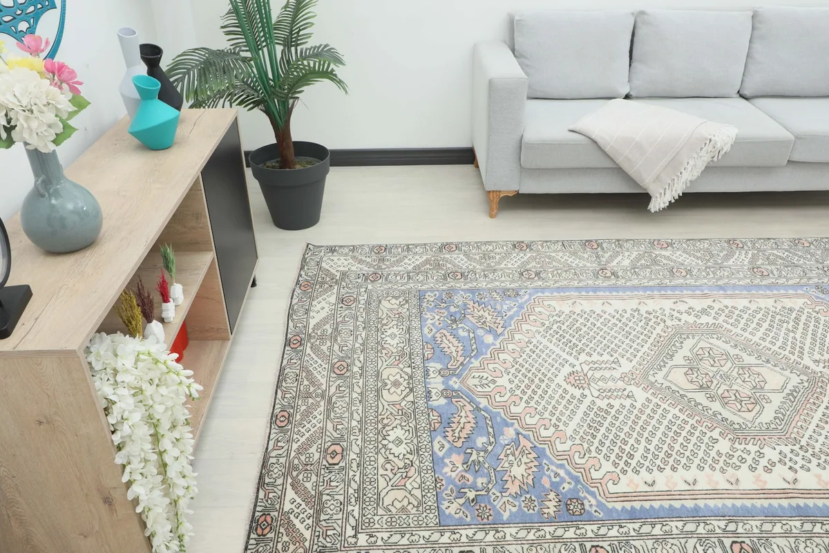 Angle view of the rug in a room, highlighting its placement next to a console table