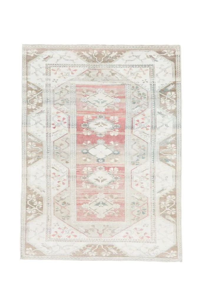 Full overhead view of the 5'10" x 7'10" vintage Anatolian rug on a white background