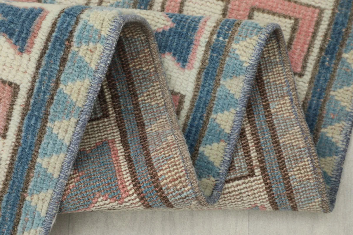 Close-up of the woven back of the rug, revealing the quality of the hand-knotting