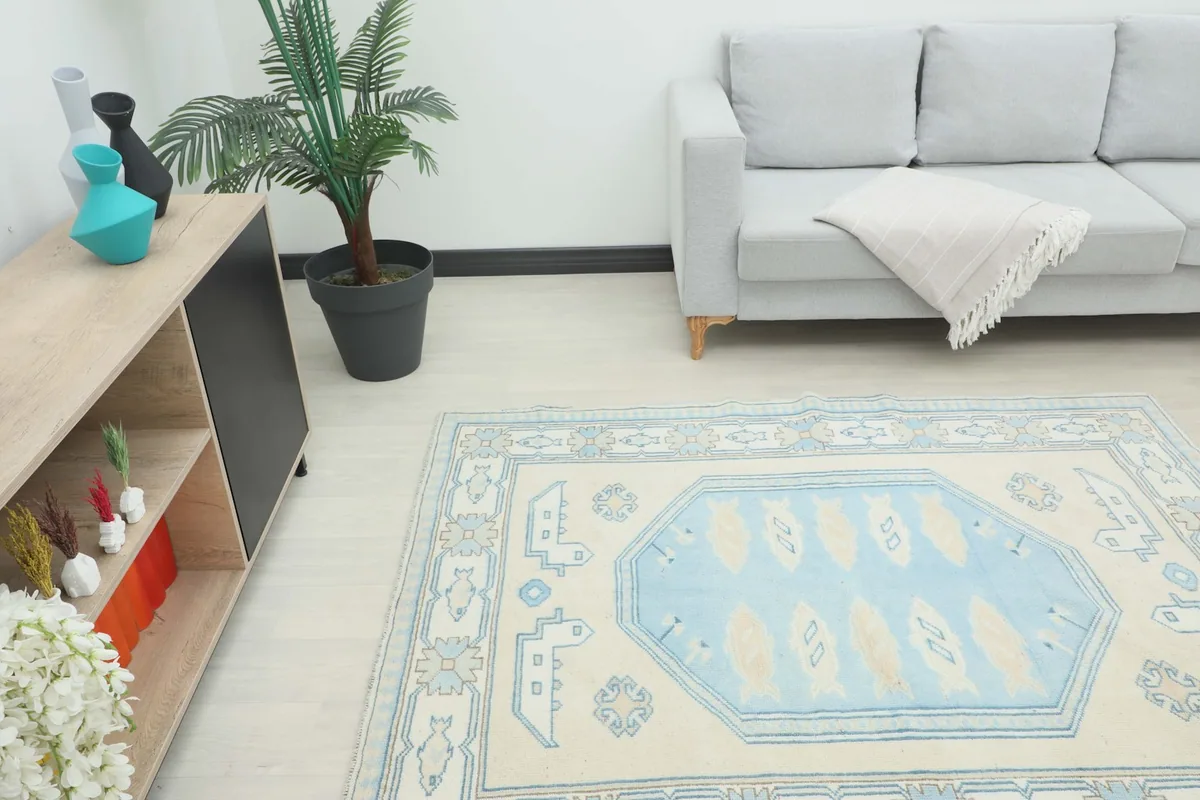 Angle view of the rug in a living room setup, highlighting its size relative to furniture