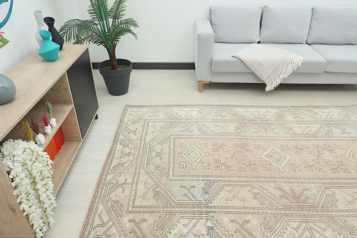 Angle view of the rug in a living room, highlighting its medium size and placement with furniture.