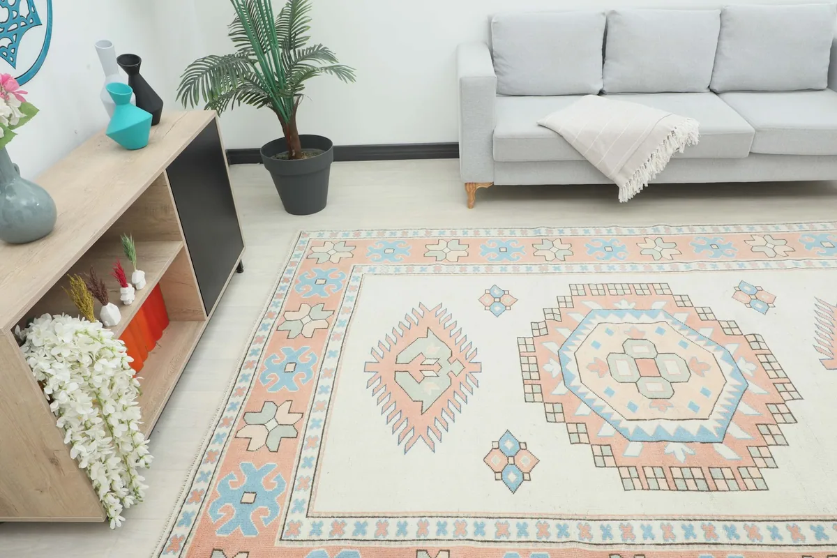 Angle view of the rug in a room, highlighting its placement relative to furniture and overall decor.
