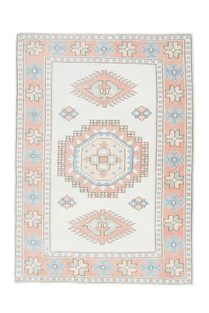 Full overhead view of the vintage Anatolian rug, emphasizing its complete design and proportions.