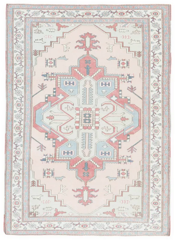Full top view of the 6'11" x 9'8" vintage Anatolian area rug with pink field and geometric patterns.