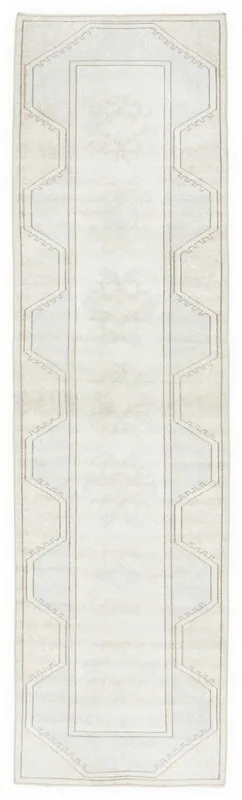 Full top view of the 2'6" x 9'1" ivory and beige geometric vintage runner rug