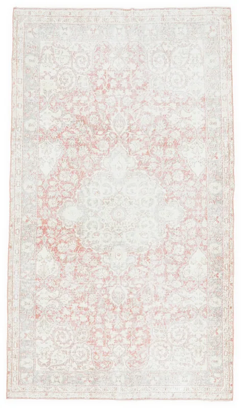 Full overhead view of the 4'9" x 8'6" vintage Anatolian rug with rose and ivory floral medallion.