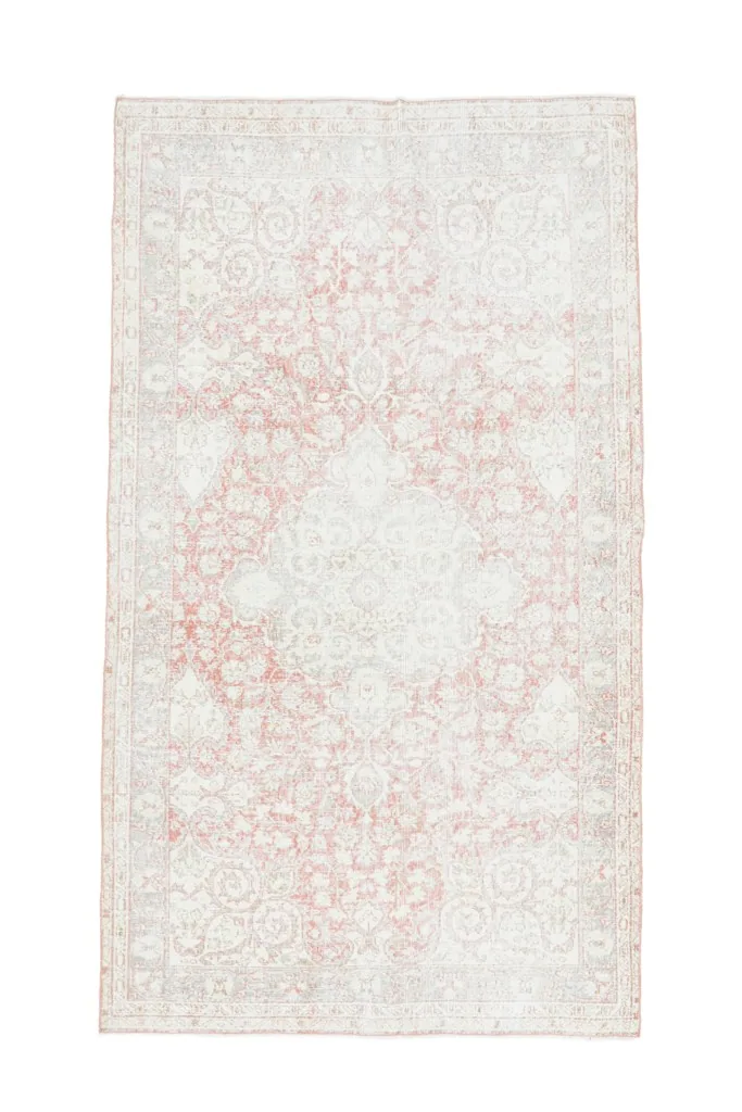 Full overhead view of the 4'9" x 8'6" vintage Anatolian rug on a white background, showing its shape.