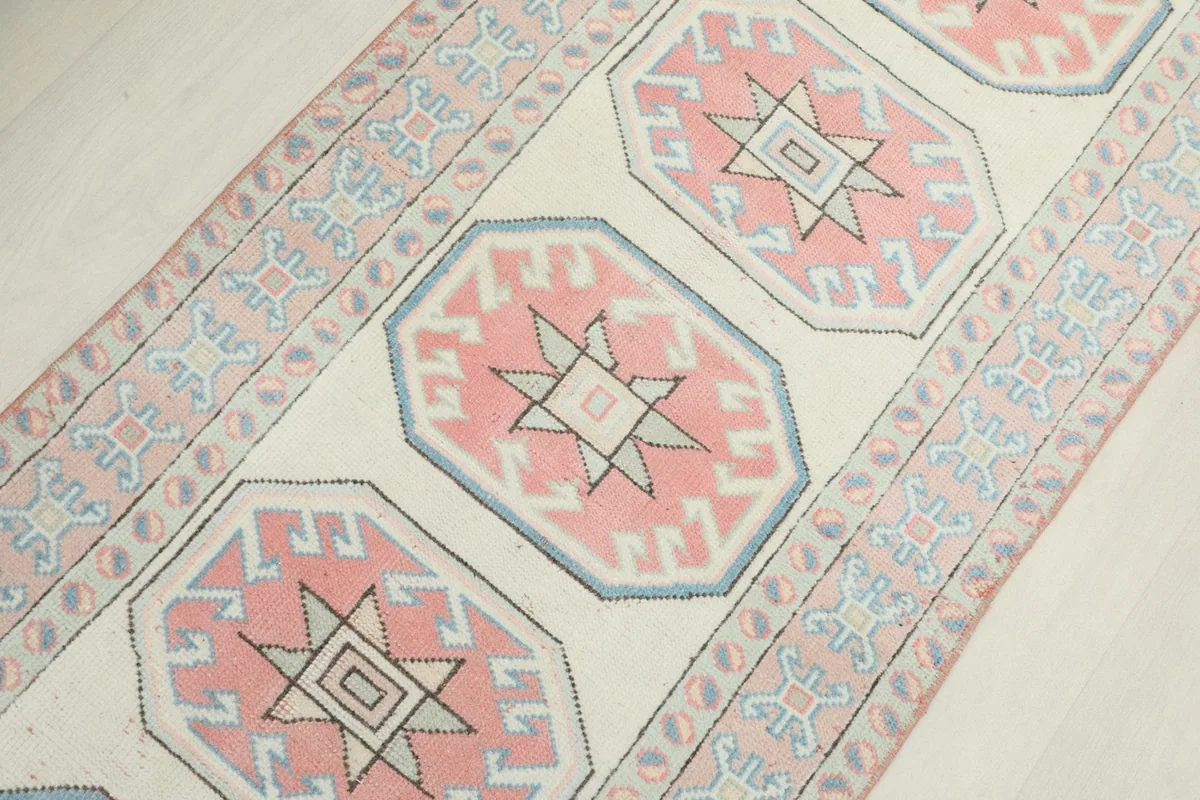 Overhead detail showing the repeating geometric design and the subtle color variations.