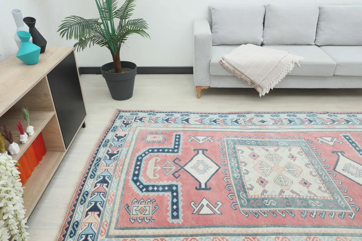 Angle view of the rug in a living room, showing its interaction with modern furniture.