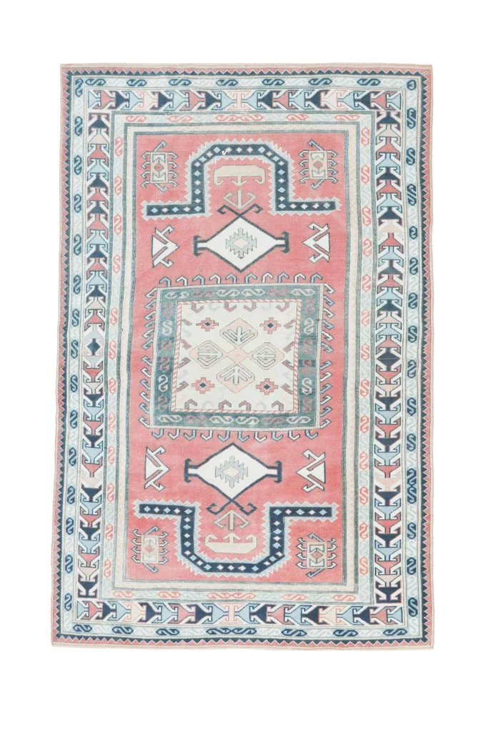 Full overhead view of the 5'9" x 9'0" vintage Anatolian rug with its distinctive geometric patterns.