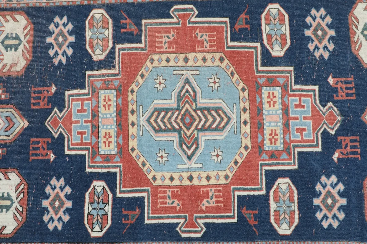 Detailed view of the central navy field with red and blue medallion
