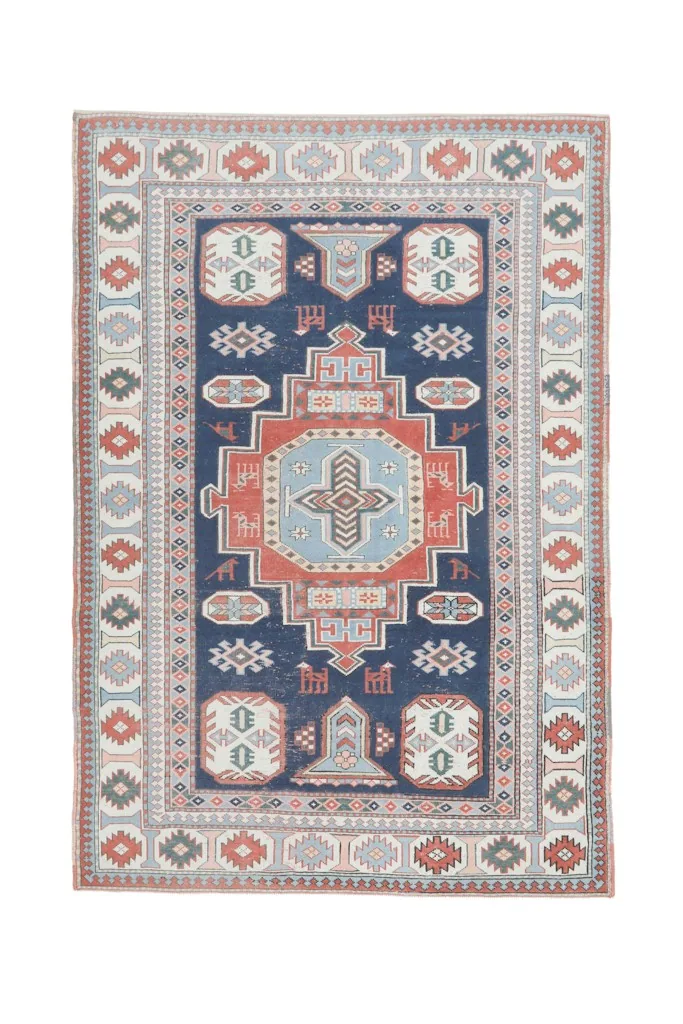 Second full overhead view of the navy, red, and ivory vintage area rug