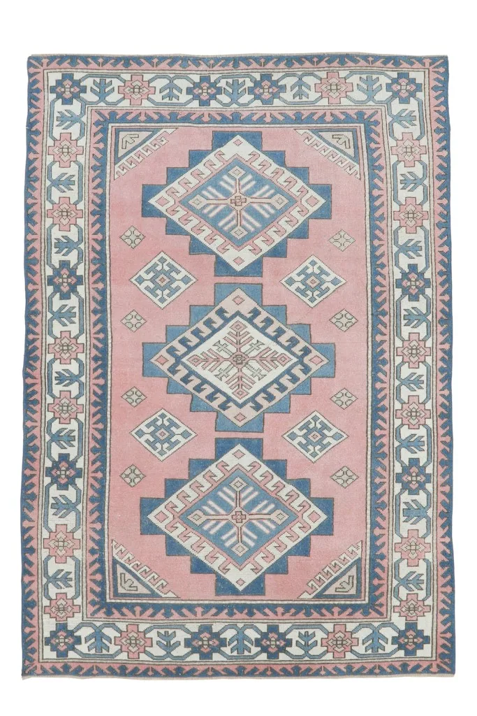 Overhead shot of the rug, providing a full view of the design and colors