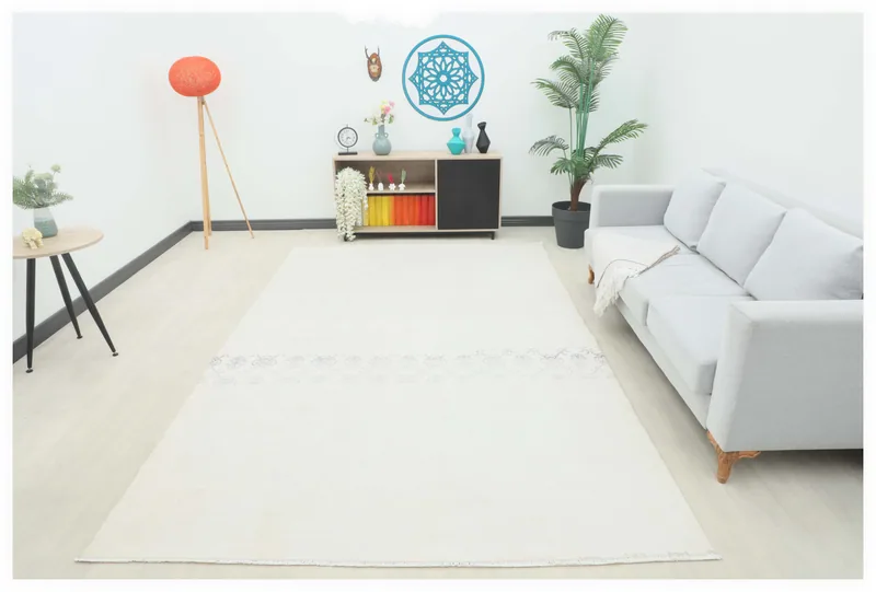 Full overhead view of the 6'10" x 10'8" ivory vintage Anatolian rug on a white background.