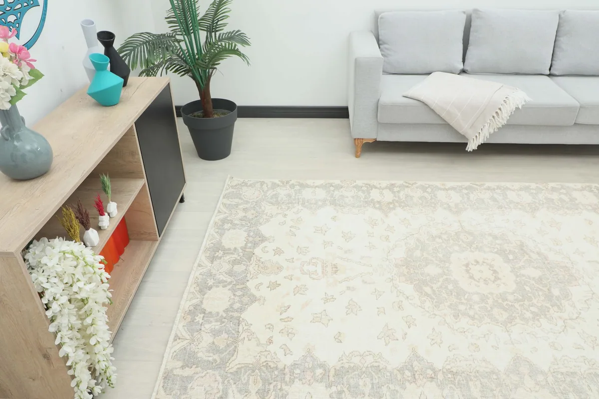 Angle view of the rug in a living room, highlighting its medium size and placement