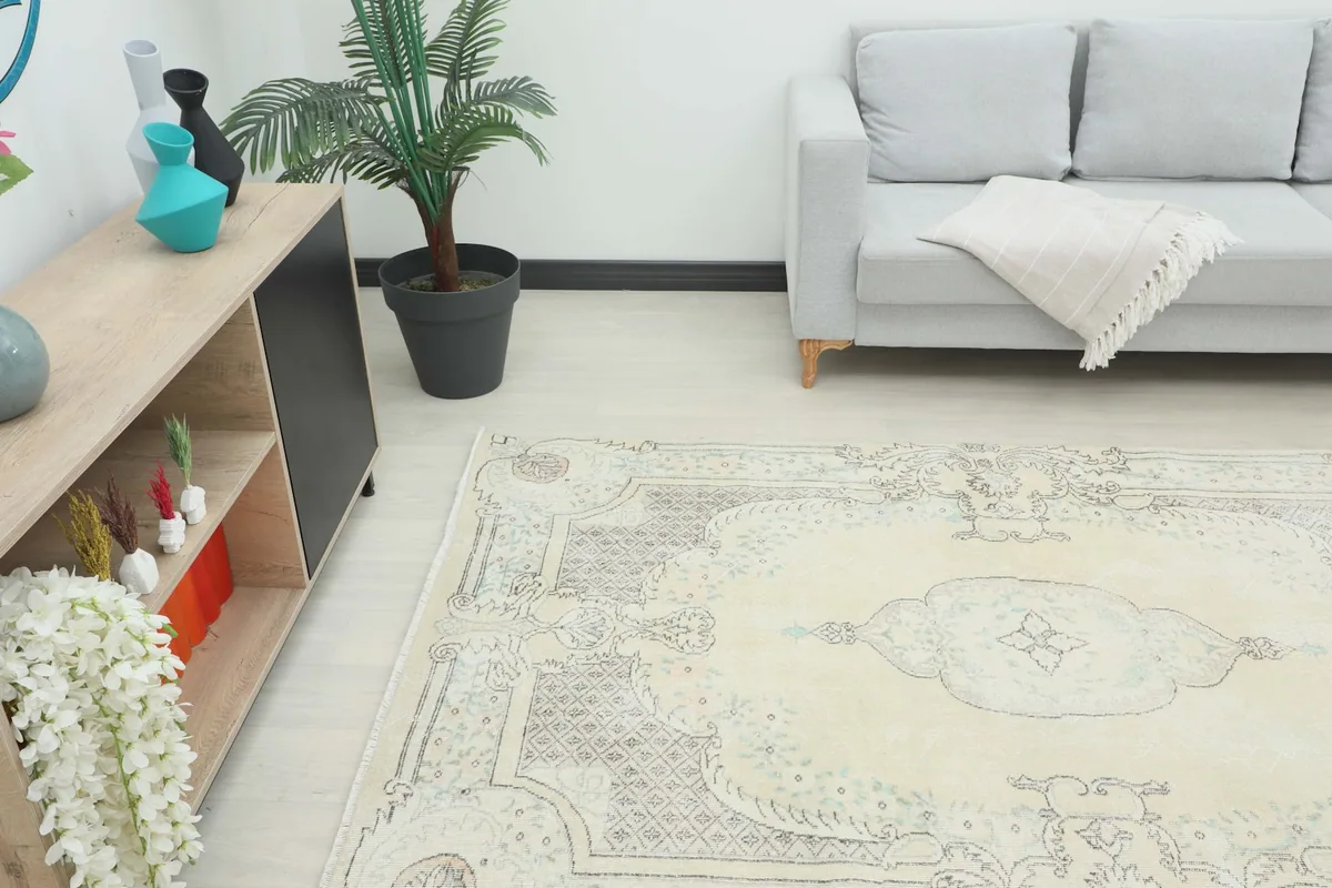 Wide shot of the rug in a room, showing its full length and width