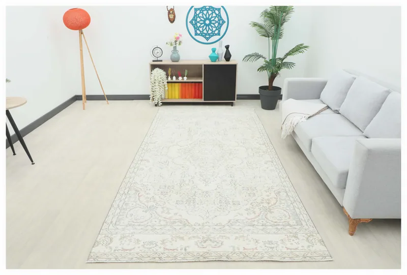 Full top view of the 5x10 ivory and beige vintage Anatolian area rug