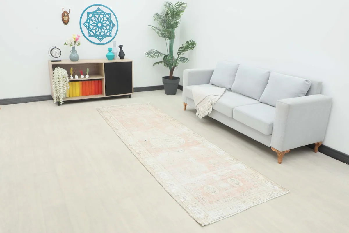 Runner rug displayed in a room setting, showing its length and how it complements modern furniture.