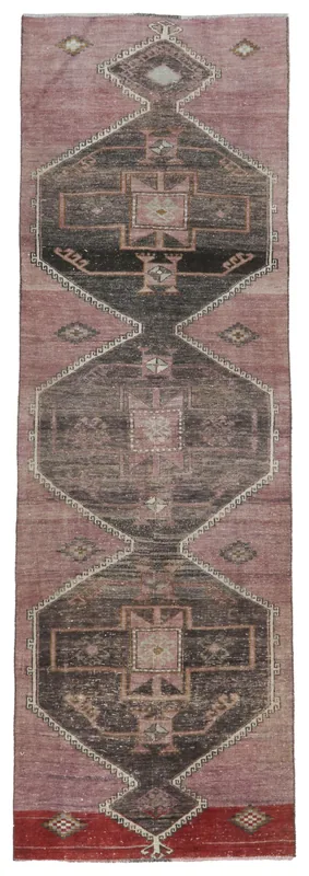 Full overhead view of the 3'1" x 10'0" rose and charcoal geometric vintage Anatolian runner rug
