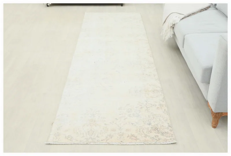 Full overhead view of the 2'11" x 9'5" vintage Anatolian runner rug on a white background.