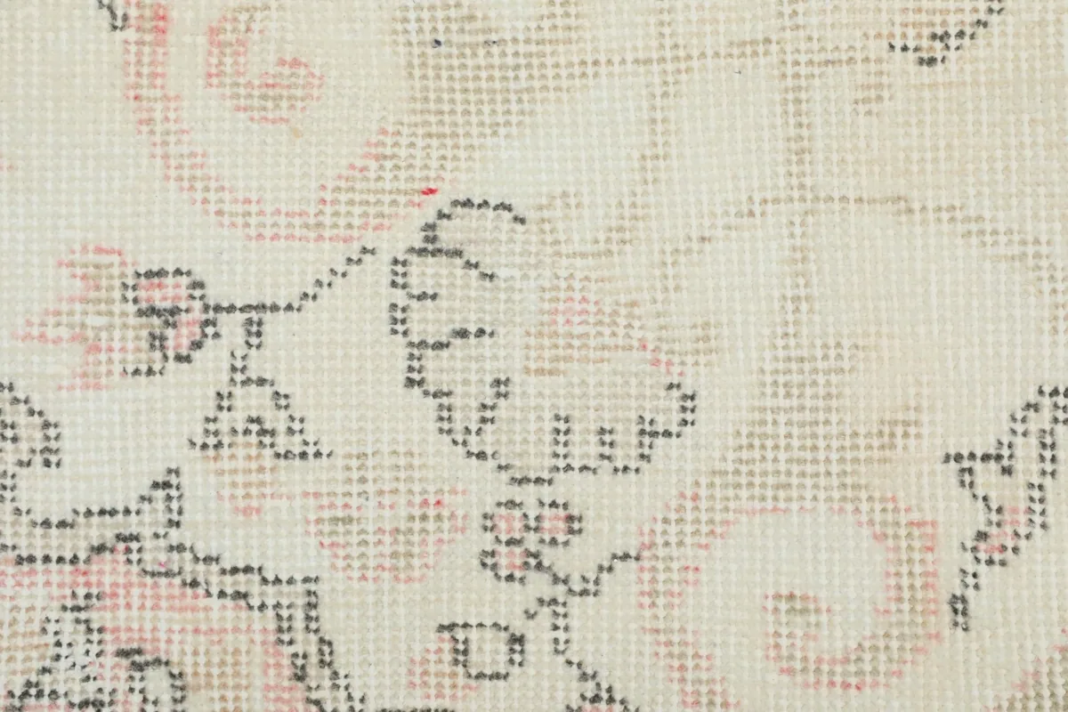 Macro view of the hand-knotted wool pile and the intricate weave