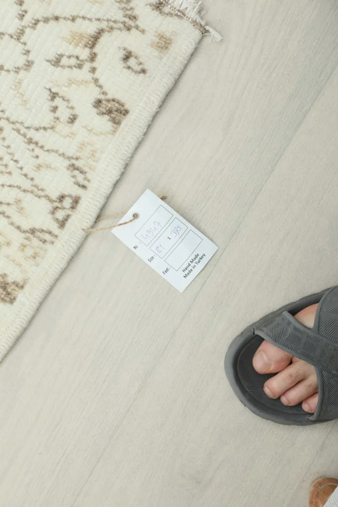 Detail shot of the product tag indicating the rug's origin from Turkey.